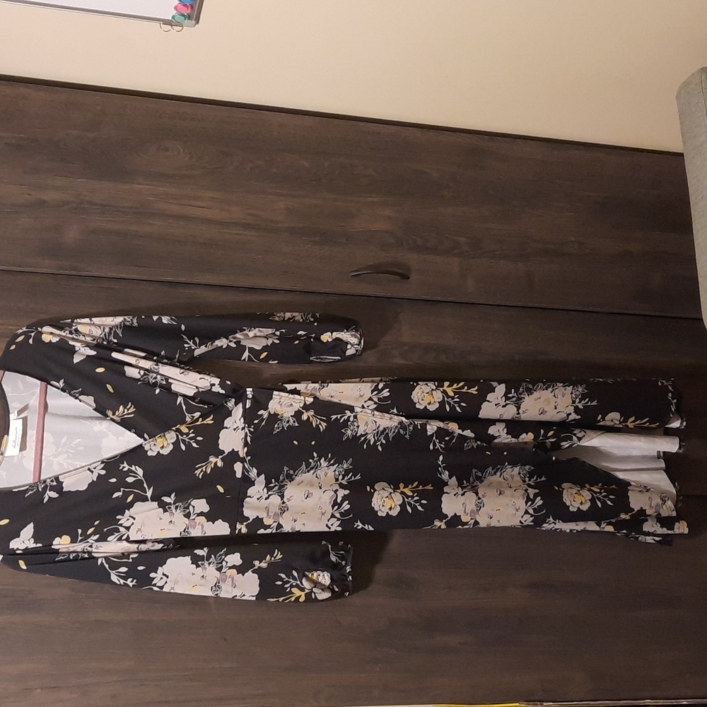 Black floral wrap dress with high front opening